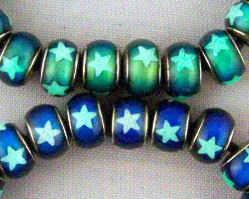 Mirage bead 7x8mm with a "glow in the dark" star.